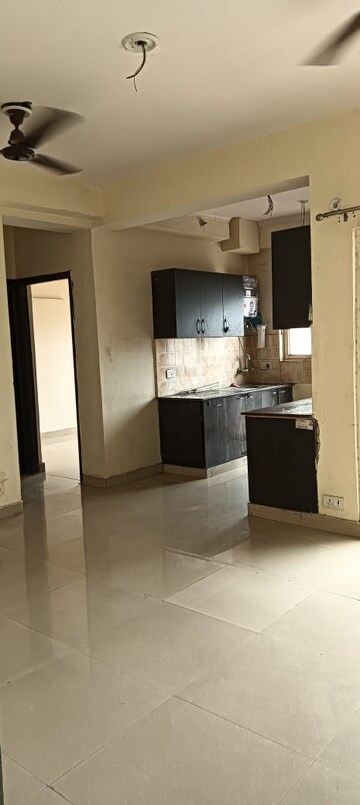 Kitchen in 2.5 BHK Apartment at Aims Golf City, Sector 75 – for Sale