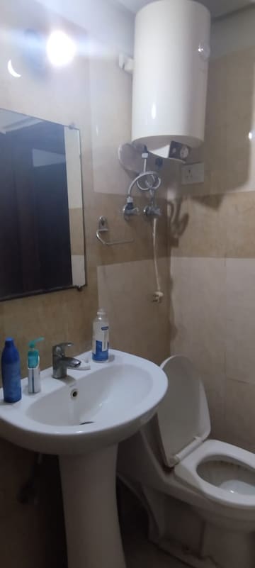Bathroom in 2 BHK Apartment at Aims Golf City, Sector 75 – for Sale