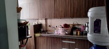 Kitchen in 2 BHK Apartment at Aims Golf City, Sector 75 – for Sale