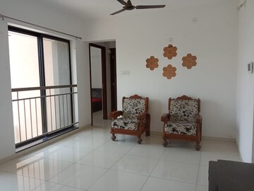 Living Room in 2 BHK Apartment at Pride World City Kingsbury, Charholi Budruk – for Sale