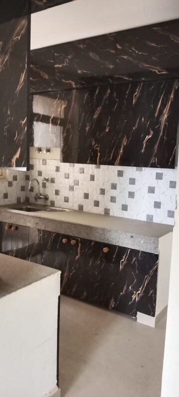 Kitchen in 4 BHK Apartment at Terra Elegance, Alwar Bypass Road – for Sale