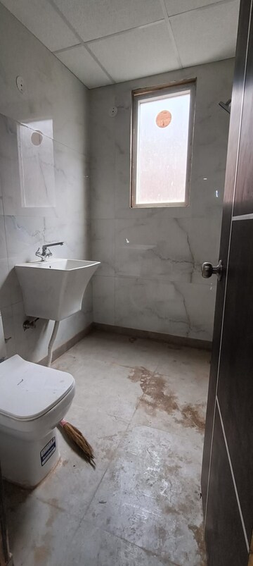 Bathroom in 3 BHK Builder Floor at DMD Hometech Awas Yojna, Sector 73 – for Sale