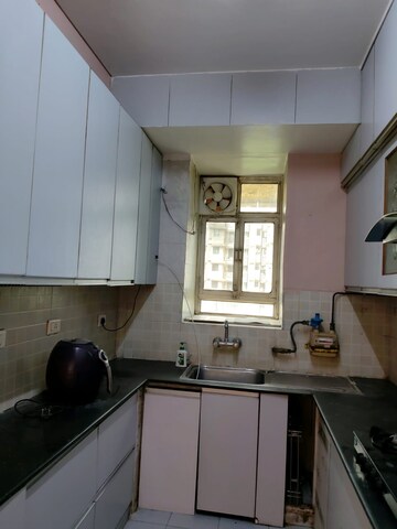Kitchen in 2 BHK Apartment at Krisumi Waterfall Residences, Sector 36a – for Sale