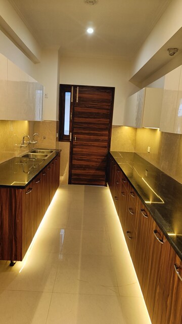 Kitchen in 3 BHK Apartment at Manohar Singh Palm Residency, Mullanpur – for Sale