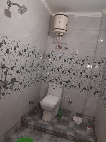 Bathroom in 3 BHK Builder Floor at Dwarka Mor – for Sale