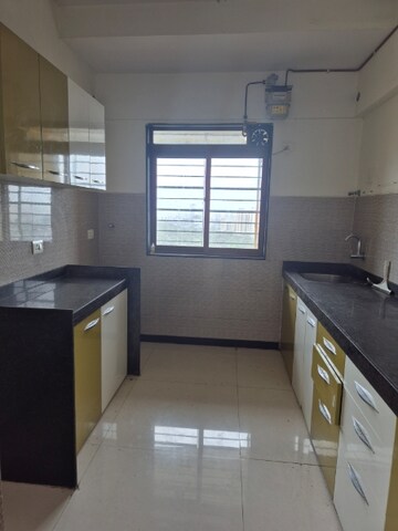 Kitchen in 2 BHK Apartment at Acme Alpinia, Ghodbunder Road – for Sale