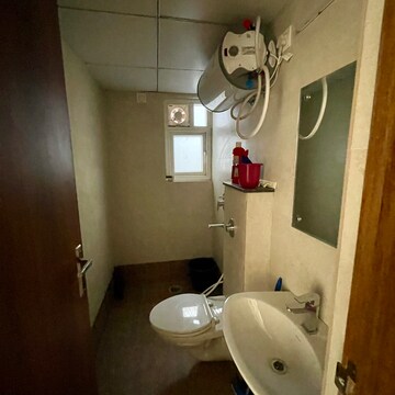 Bathroom in 1 BHK Apartment at Pacific Golf Estate, Kulhan – for Sale