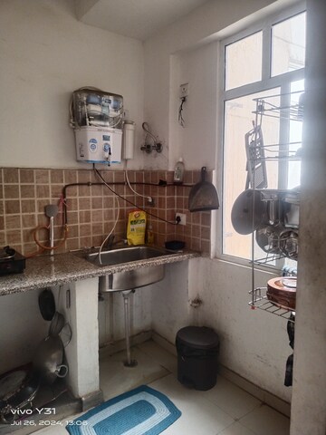 Kitchen in 2 BHK Apartment at Mahagun Mywoods, Sector 16c Greater Noida – for Sale