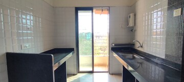 Kitchen in 1 BHK Apartment at Regency Sarvam, Titwala – for Sale
