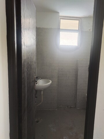Bathroom in 3 BHK Apartment at Vasundhara Sector 13 – for Sale