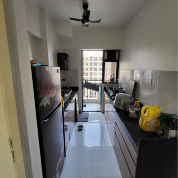 Kitchen in 1.5 BHK Apartment at Runwal Gardens Phase I, Kalyan Shilphata Road – for Sale