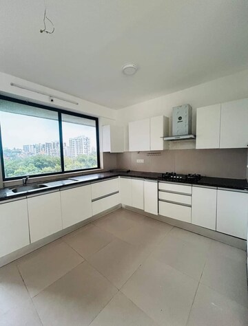 Kitchen in 4 BHK Apartment at Acropolis Purple Nine Hills, Kondhwa – for Sale