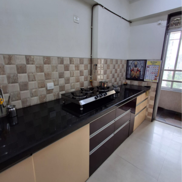 Kitchen in 3 BHK Apartment at Divine Aspen Garden, Sonawala Industry Estate – for Sale