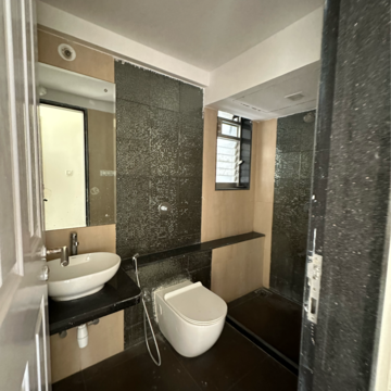 Bathroom in 2 BHK Apartment at Divine Aspen Garden, Sonawala Industry Estate – for Sale