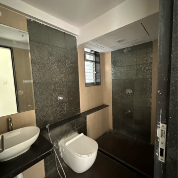 Bathroom in 2 BHK Apartment at Divine Aspen Garden, Sonawala Industry Estate – for Sale