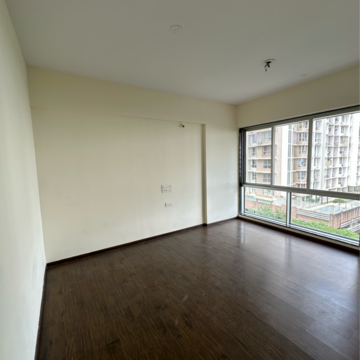 Room in 2 BHK Apartment at Divine Aspen Garden, Sonawala Industry Estate – for Sale