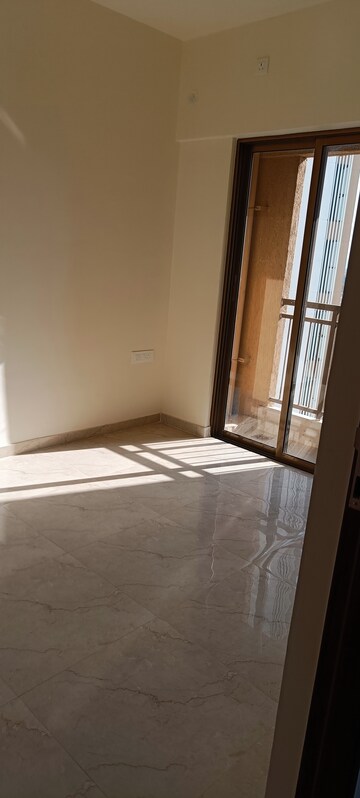 Room in 2 BHK Apartment at Sunteck West World, Naigaon East – for Sale