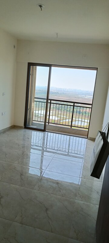 Room in 2 BHK Apartment at Sunteck West World, Naigaon East – for Sale