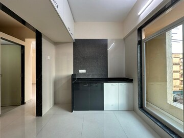 Kitchen in 2 BHK Apartment at Mohan Suburbia, Ambernath West – for Sale