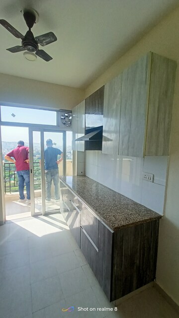 Kitchen in 3 BHK Apartment at DLF The Skycourt, Sector 86 – for Sale