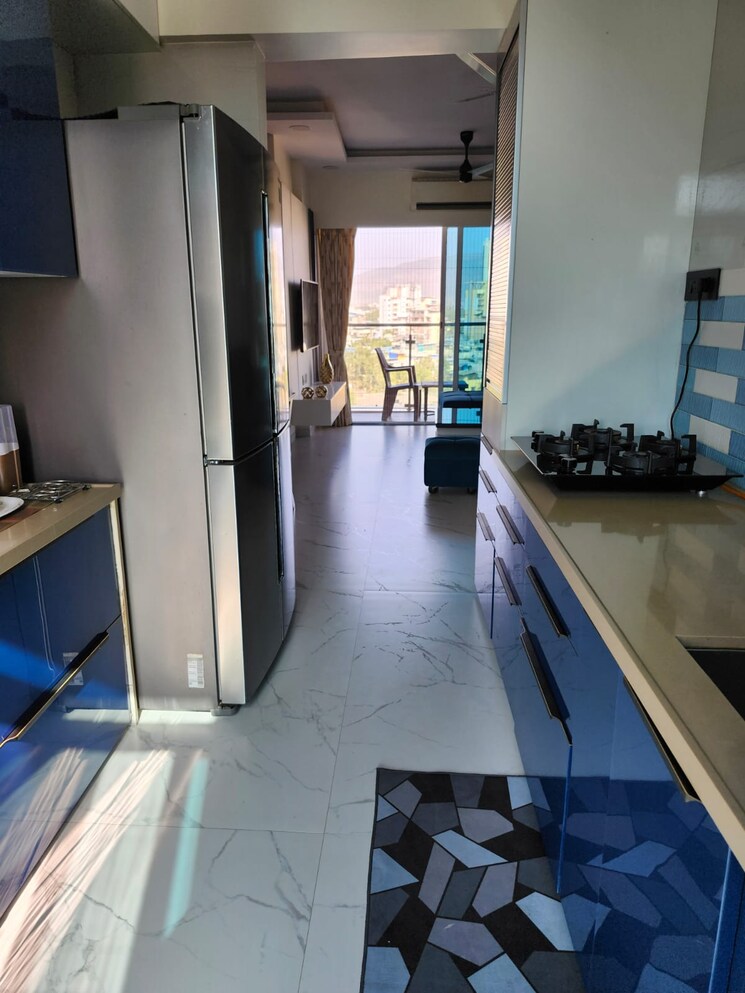 Kitchen, archstone-infinity-tower 3 Bedroom 953 Sq.Ft. Apartment In Kopar Khairane Navi Mumbai 7348893