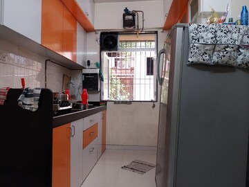 Kitchen in 2 BHK Apartment at Siddhachal Phase 5 CHS Ltd, Vasant Vihar – for Sale