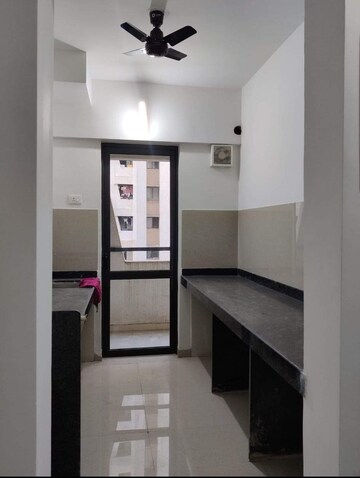 Kitchen in 1.5 BHK Apartment at Lodha Palava City Lakeshore Greens, Dombivli East – for Sale