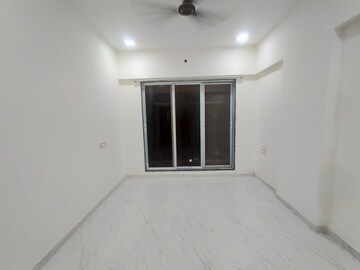 Master Bedroom in 2 BHK Apartment at Mary Villa CHS, Borivali West – for Sale