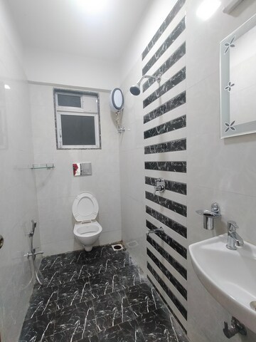 Bathroom in 2 BHK Apartment at Mary Villa CHS, Borivali West – for Sale