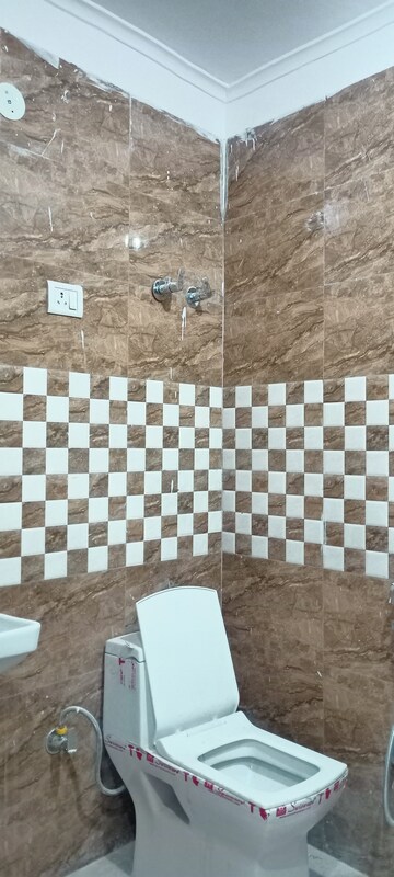 Bathroom in 1 BHK Builder Floor at Chattarpur – for Sale
