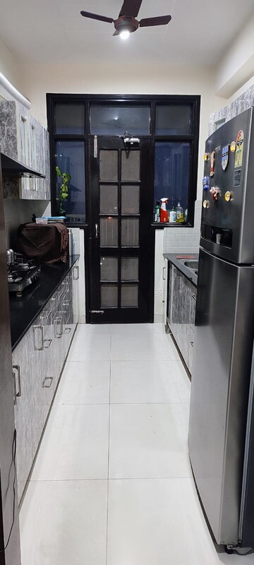 Kitchen in 3 BHK Apartment at Golden Sand Apartments, Dhakoli Village – for Sale