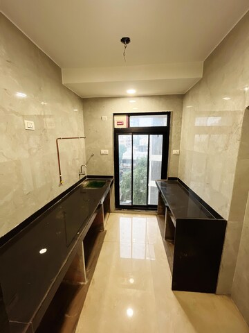 Kitchen in 1 BHK Apartment at Panom Park Malad, Malad West – for Sale