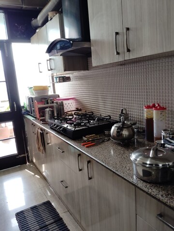 Kitchen in 3 BHK Apartment at New Generation Maple Apartments, Dhakoli Village – for Sale