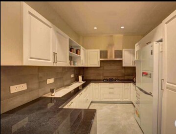 Kitchen in 3 BHK Apartment at Dhakoli Village – for Sale