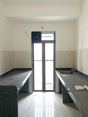 Kitchen in 1.5 BHK Apartment at Dombivli East – for Sale