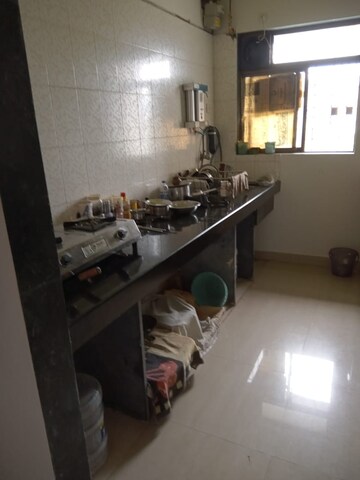 Kitchen in 3 BHK Apartment at Bluebell Apartments, Ghodbunder Road – for Sale