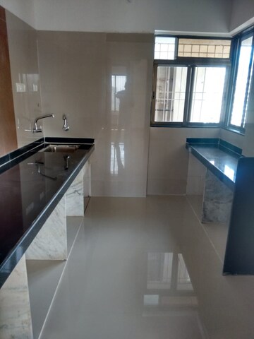 Kitchen in 3 BHK Apartment at Cosmos Horizon Phase 2, Pokhran Road No 2 – for Sale