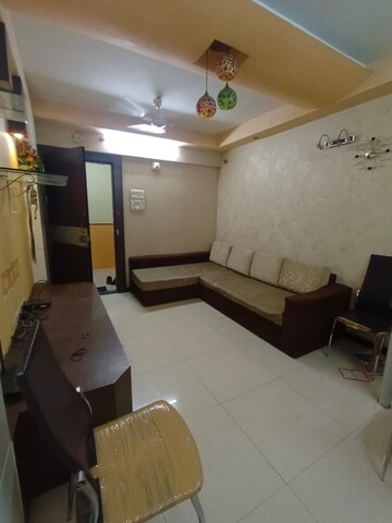 Living Room in 1 BHK Apartment at Siddhi Highland Springs, Dhokali – for Sale