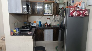 Kitchen in 2 BHK Apartment at Ajnara Le Garden, Sector 16b Greater Noida – for Sale