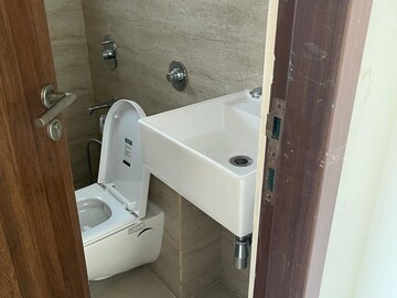 Bathroom in 2 BHK Apartment at Sunteck West World, Naigaon East – for Sale