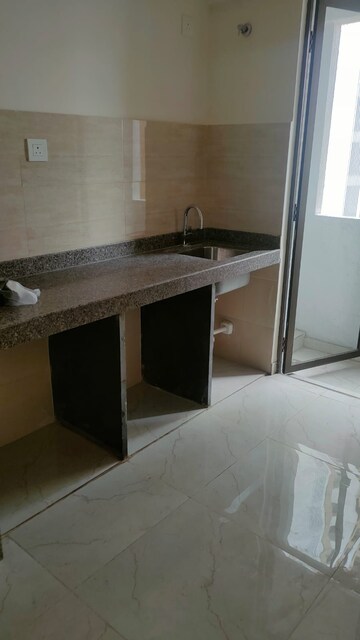Kitchen in 2 BHK Apartment at Sunteck West World, Naigaon East – for Sale