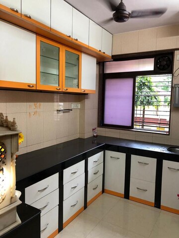 Kitchen in 1 BHK Apartment at Vasant Sagar, Kandivali East – for Sale