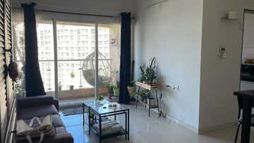 Living Room in 2 BHK Apartment at Rustomjee Azziano Wing D, Majiwada – for Sale