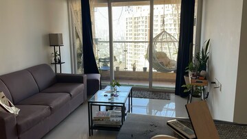 Living Room in 2 BHK Apartment at Rustomjee Azziano Wing D, Majiwada – for Sale
