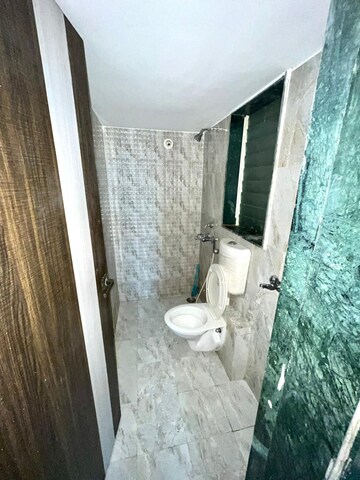 Bathroom in 1 BHK Apartment at Mohan Willows, Badlapur East – for Sale