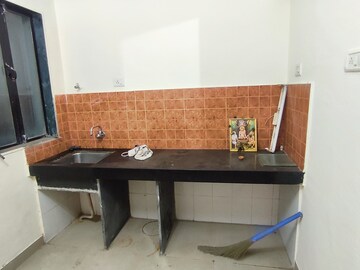 Kitchen in 1 BHK Apartment at Kavya Hill View CHS, Anand Nagar – for Sale