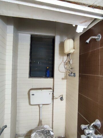Bathroom in 1 BHK Apartment at Kavya Hill View CHS, Anand Nagar – for Sale