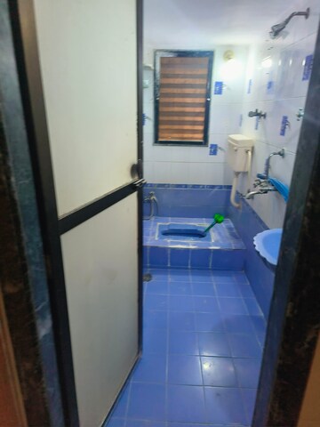 Bathroom in 2 BHK Apartment at Parikh Premium Park, Virar West – for Sale