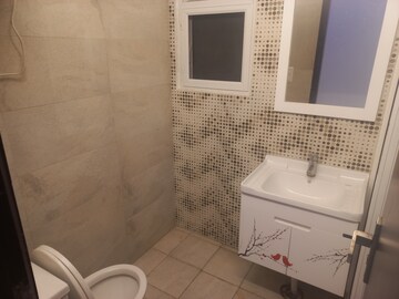 Bathroom in 4 BHK Apartment at Elite Golf Green, Sector 79 – for Sale
