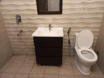 Bathroom in 4 BHK Apartment at Elite Golf Green, Sector 79 – for Sale